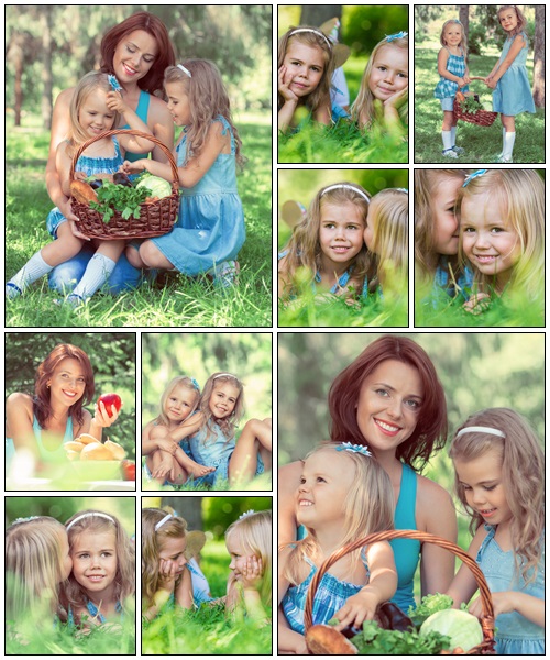 Mother and daughters in the summer park - Stock Photo