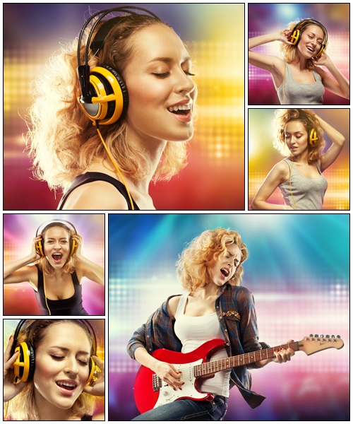 Happy woman listening music with headphones - Stock Photo