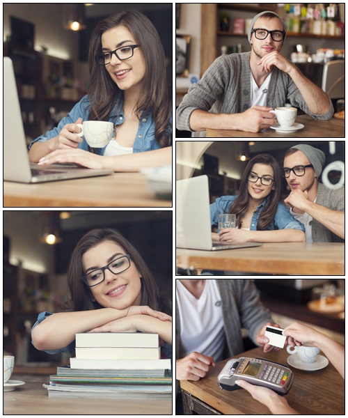 Young people enjoying the wireless internet at cafe - Stock Photo